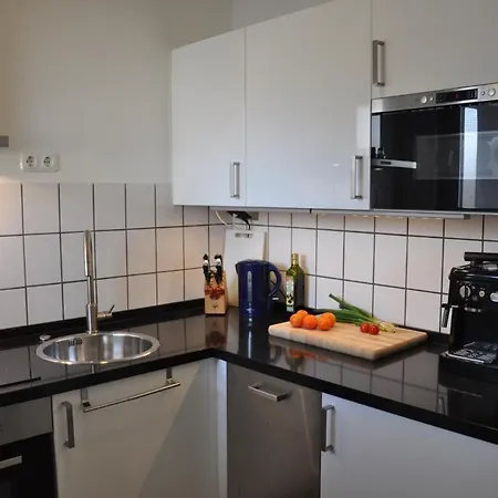 펜션 Sonnige Ferienwohnung 부숨